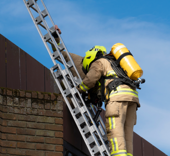 Fireman climbing onto house_1.png